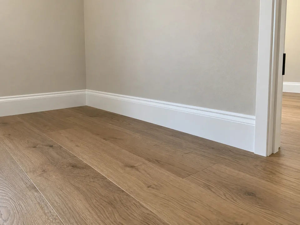 Finished baseboard installation and repair by Westpeak Construction in Orange County